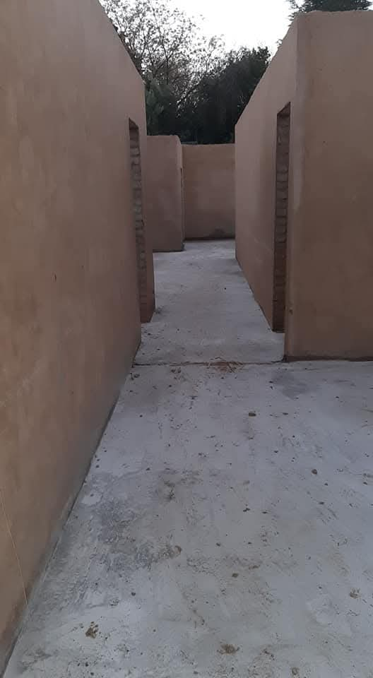 Plastered internal walls and floated floors of a new build